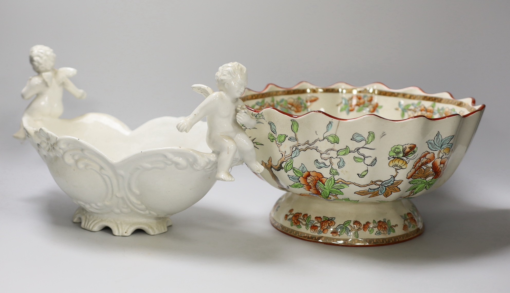 An Italian pottery 'cherub' dish and a Copeland pottery bowl